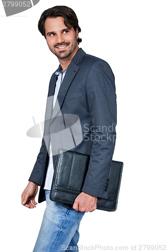 Image of Handsome stylish man carrying a briefcase