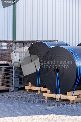 Image of Rolls of black industrial plastic