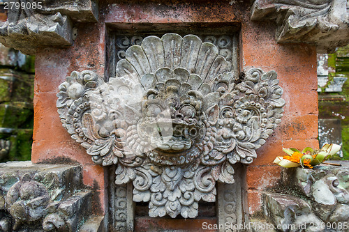 Image of Ornate column in formal Balinese garden