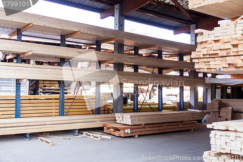 Image of Wooden panels stored inside a warehouse