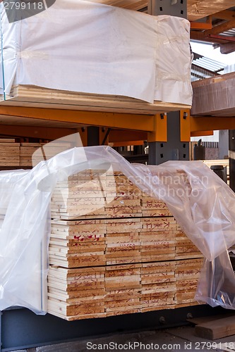 Image of Wooden panels stored inside a warehouse