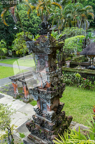 Image of Ornate column in formal Balinese garden