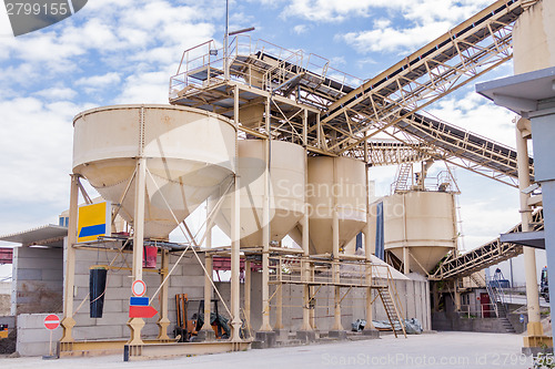 Image of Metal tanks at a refinery plant or factory