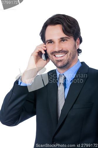 Image of Stylish businessman talking on his mobile phone