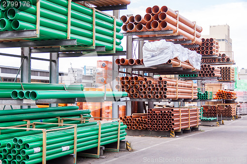 Image of Plastic pipes in a factory or warehouse yard
