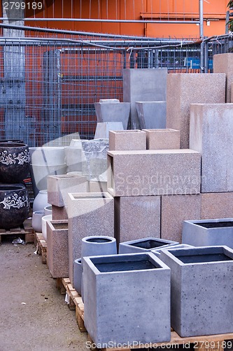 Image of Glazed and unglazed ceramic flower pots