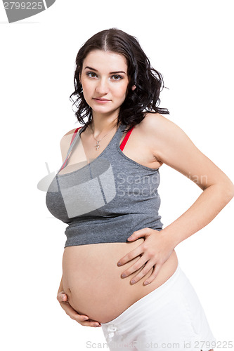 Image of Happy beautiful young pregnant woman