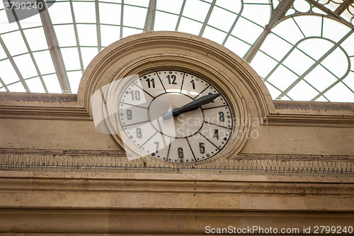 Image of Clock in a stone building facade