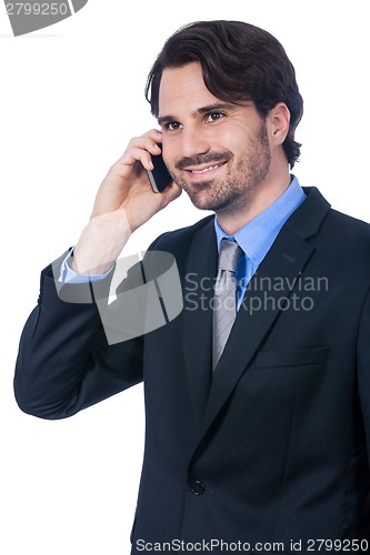 Image of Stylish businessman talking on his mobile phone