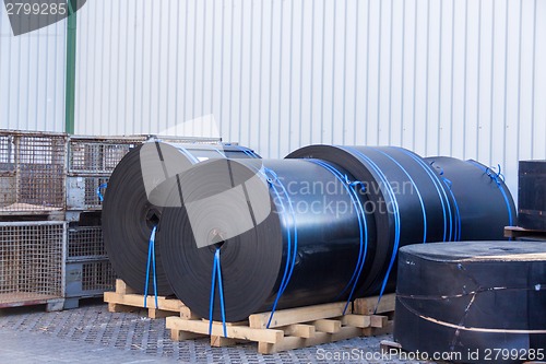 Image of Rolls of black industrial plastic