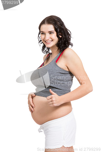 Image of Pregnant woman giving a thumbs up gesture