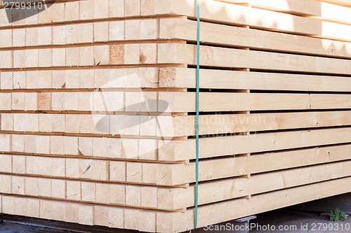 Image of Wooden panels stored inside a warehouse