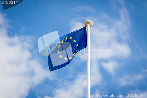 Image of The fluttering flag of European Union on a pole