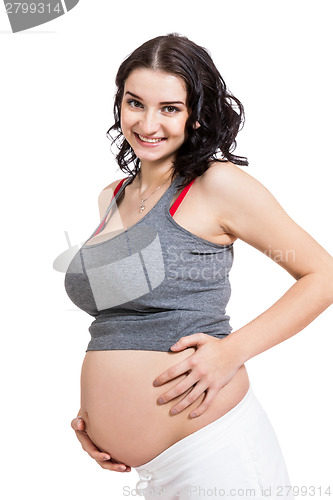 Image of Happy beautiful young pregnant woman