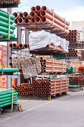 Image of Plastic pipes in a factory or warehouse yard