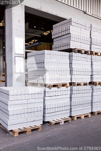 Image of Cement building blocks stacked on pallets