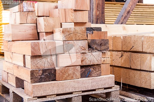 Image of Wooden panels stored inside a warehouse