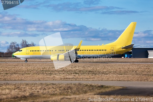 Image of Passenger airliner taking off at an airport