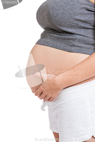 Image of Happy beautiful young pregnant woman