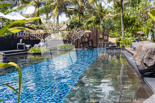 Image of Person swimming in a pool in Bali
