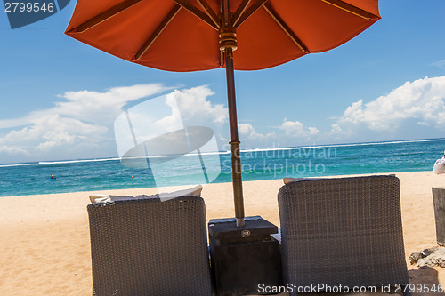 Image of Beach umbrellas on a beautiful beach in Bali