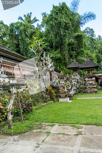 Image of Ornate column in formal Balinese garden