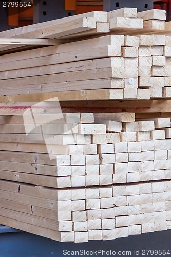 Image of Wooden panels stored inside a warehouse