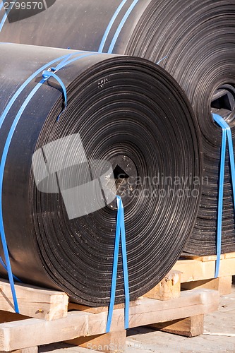 Image of Rolls of black industrial plastic