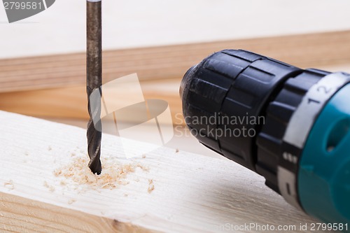 Image of Battery operated hand drill and bit