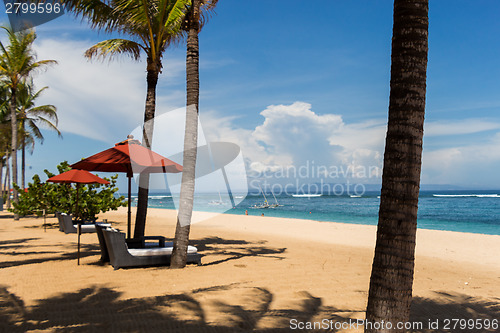 Image of Beach umbrellas on a beautiful beach in Bali