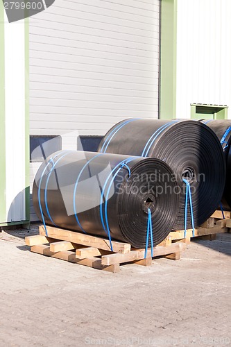 Image of Rolls of black industrial plastic