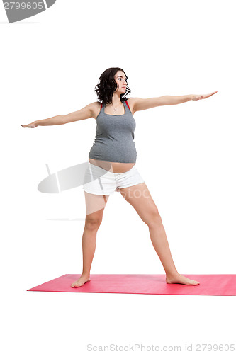 Image of Pregnant woman doing aerobics exercises