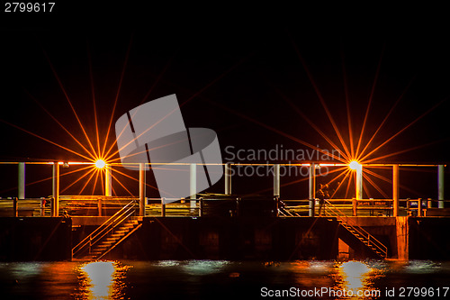 Image of Night scene of a dock or pier with steps