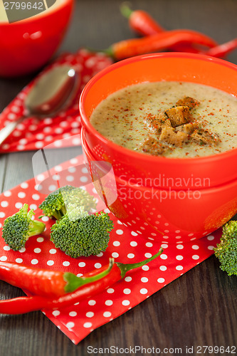 Image of Bowl of chili pepper and broccoli soup