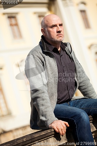 Image of Stylish man in sunglasses enjoying the sun