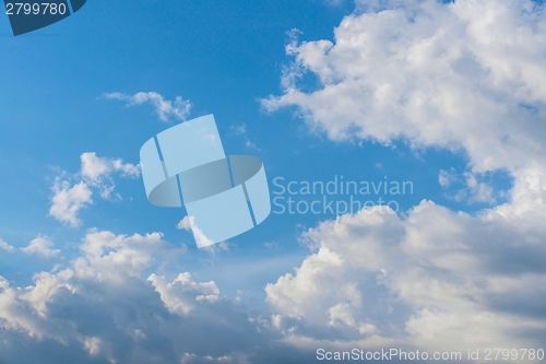 Image of Blue sky with fluffy clouds