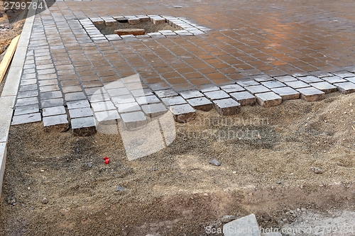 Image of Incomplete road with small stones