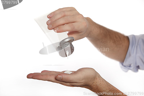 Image of Man uses hand cream