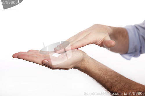 Image of Man uses hand cream