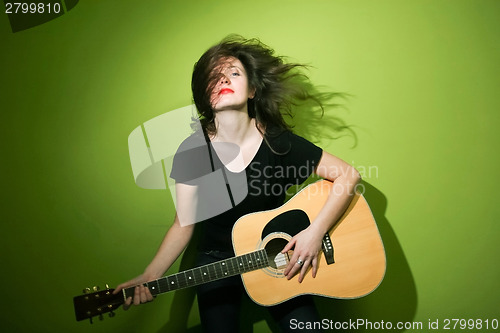 Image of Rock woman with guitar