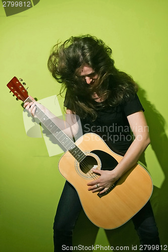 Image of Rock woman and guitar