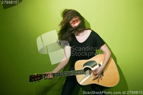 Image of Sexy guitar woman