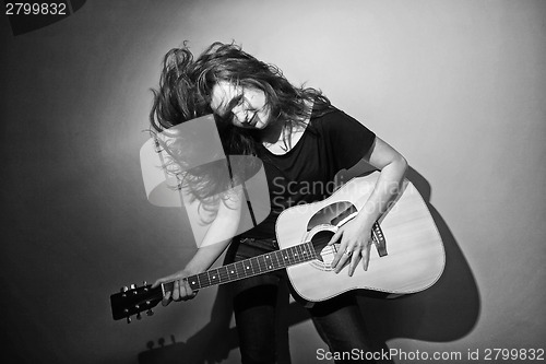 Image of Guitar woman