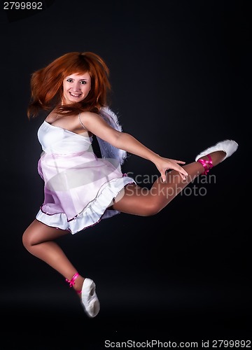 Image of Attractive girl jumping