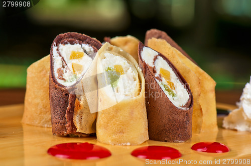 Image of pancake roll with marmalade