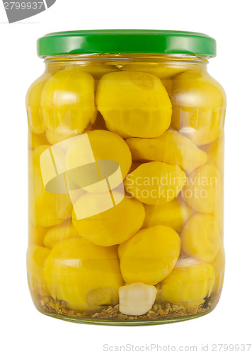 Image of pickled decorative patisson  jar on white 