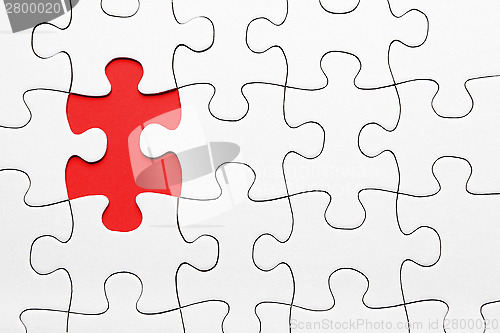 Image of Red puzzle piece missing