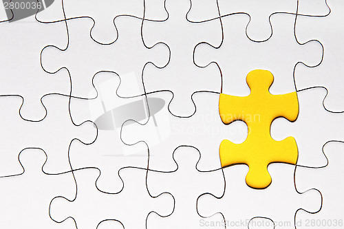 Image of Yellow puzzle piece