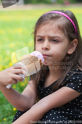 Image of Little girl with ice cream