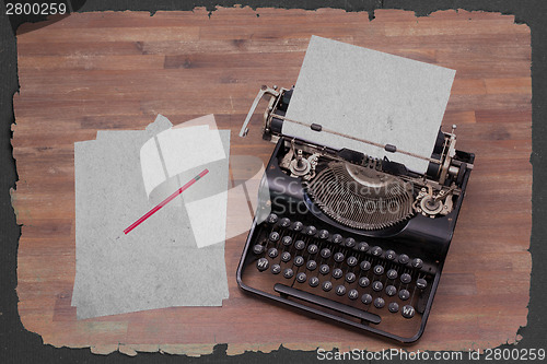 Image of Vintage typewriter and old books